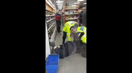 Shocking moment 'heavy-handed' cops repeatedly knee man