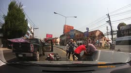 Good Samaritans subdue motorcyclist who smashed car window in road rage
