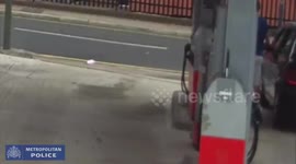 Police are hunting a driver who dragged a woman down the street when she tried to stop him leaving a petrol garage without paying