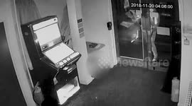 Bungling burglars flee empty-handed after anti-theft gas machine causes them to stumble blindly from scene as building fills with smoke