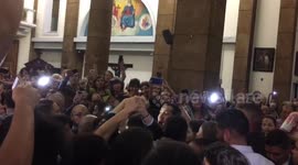 Well-wishers pack Caracas church to greet Guaido at Mass for Lent