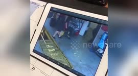 Man falls backwards into garage inspection pit