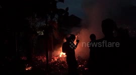 Locals from Bali launch fireballs at each other in a ritual aptly named 'fire wars'