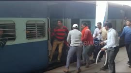 Terrifying moment passenger is saved from going under train