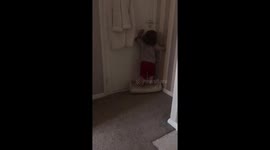 Baby escape artist needs a boost to unlock the door to his room