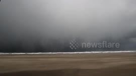 Winter Thunderstorm Approaching Popular Beach