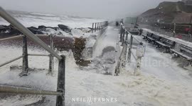 Sea foam froths into wind as Storm Gareth strikes Dorset