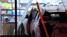 Car drives through drug store pharmacy window in Toronto