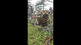 Pineapple farmers carry over 100-kilo-weight baskets showing immense strength