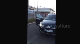 A man with no hands drives a car!