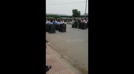 The couples take part in the sack dance race