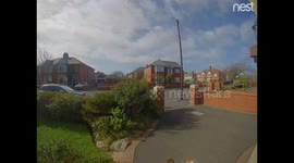 Hilarious moment dog walker lands in bushes after yanking the handle off his front door