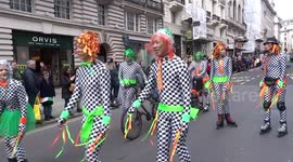 St Patricks Day Parade in London - roller skaters and London GAA