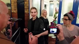 Lily James greets fans and signs autographs