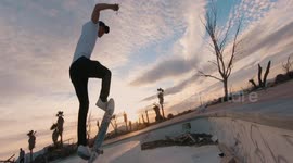 Watch drone racing footage of a skateboarder hurtling through an abandoned US water park