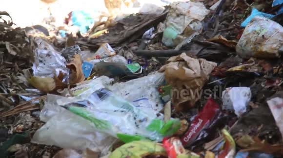 Shocking footage shows stream in Kenyan capital flooded with rubbish