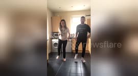 Siblings use kitchen tiles as synchronised dance mat