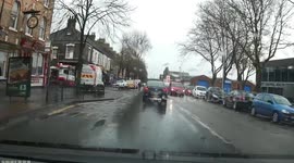 Car crash ends up parked on a bench.