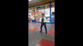 Security Guard Dances Outside Supermarket