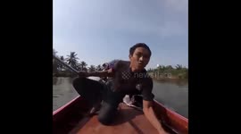 Man in Thailand shows off EXTREME engine power on his longtail boat