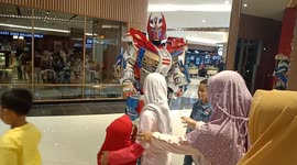 Pair of 'Transformers' show up to take selfies at mall in Indonesia