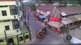 Angry elephant goes on rampage,mahout escapes holding a lamp post