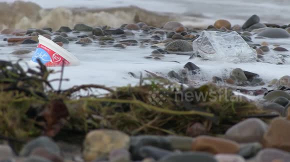Plastic litter being removed from beach 2