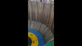 Death well motorcycle stuntman delivers dropped cap to audience member