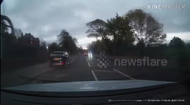 Cyclist nearly runs into back of car