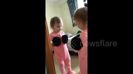 Caught my 2 year old posing in the mirror with my ear muffs