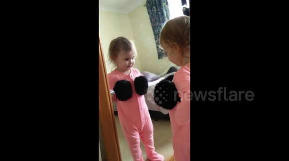 Caught my 2 year old posing in the mirror with my ear muffs