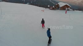 4K 422 golden hour sunset on  snowy mountains drone shot