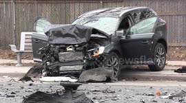 Toronto police investigate spectacular three car fatal crash in city intersection that left one dead and others badly injured