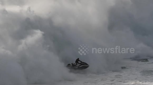 Surfer's massive wipeout followed by incredible jet ski rescue in Portugal