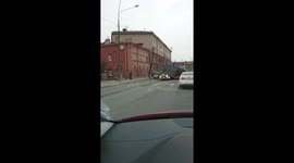 A truck with scrap metal fell on cars on the road in St. Petersburg.