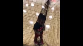 Hilarious moment one-year-old gets caught in net