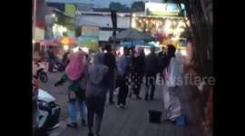 Ghost prankster sparks fear for visitors and small children at park in Indonesia