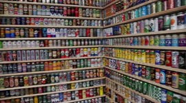A man has been officially named as the ''Dullest In Britain'' after unveiling the UK's largest collection of BEER cans - over 9,000