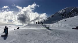 Novice skier falls on box