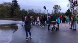 Crowd Gathers To Watch Flooded Highway 34 In Oregon