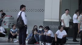 Sombre scenes from Bangkok shopping mall where fire killed two workers 'who stayed behind to fight flames'