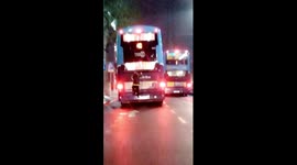 Watch shocking moment 'irresponsible' teen jumps onto back of MOVING double decker bus