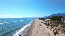 Spanish Beach line flying view from drone, Marbella Spain