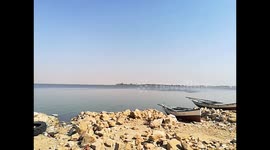 Kids Playing At Shore Next To Boats In Qaroun Wonder Lake Egypt