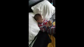 Baby watching Tiger Woods win the Masters