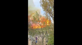Black smoke as fire burns roof of Notre Dame