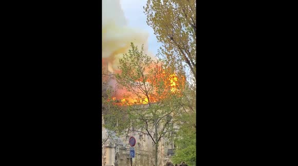 Black smoke as fire burns roof of Notre Dame