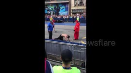 Marine running in honour of fallen comrades crawls to Boston Marathon finish line