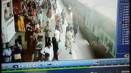 A passenger had a close shave with death after he nearly slipped and fell off from a moving train in western India