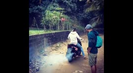 Quick lesson: how to ride a scooter in Madagascar.